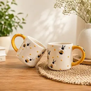 Cute Honey Bee Printed Ceramic Coffee Mugs Set of 2 | White Tea Cups with Yellow Round Handles | Designer Mugs for Tea, Coffee, Milk & Gifting